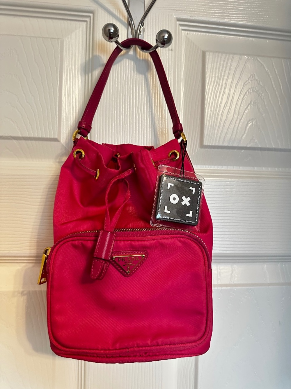 Prada’s pink nylon bucket bag with drawstring closure